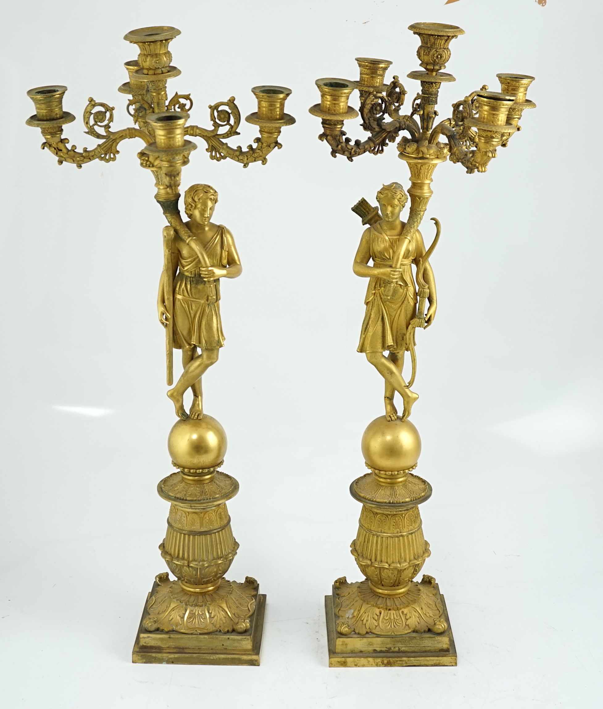 After Pierre-Philippe Thomire (1751-1843), a pair of Regency French Empire five light candelabra 25cm wide, 64cm high
